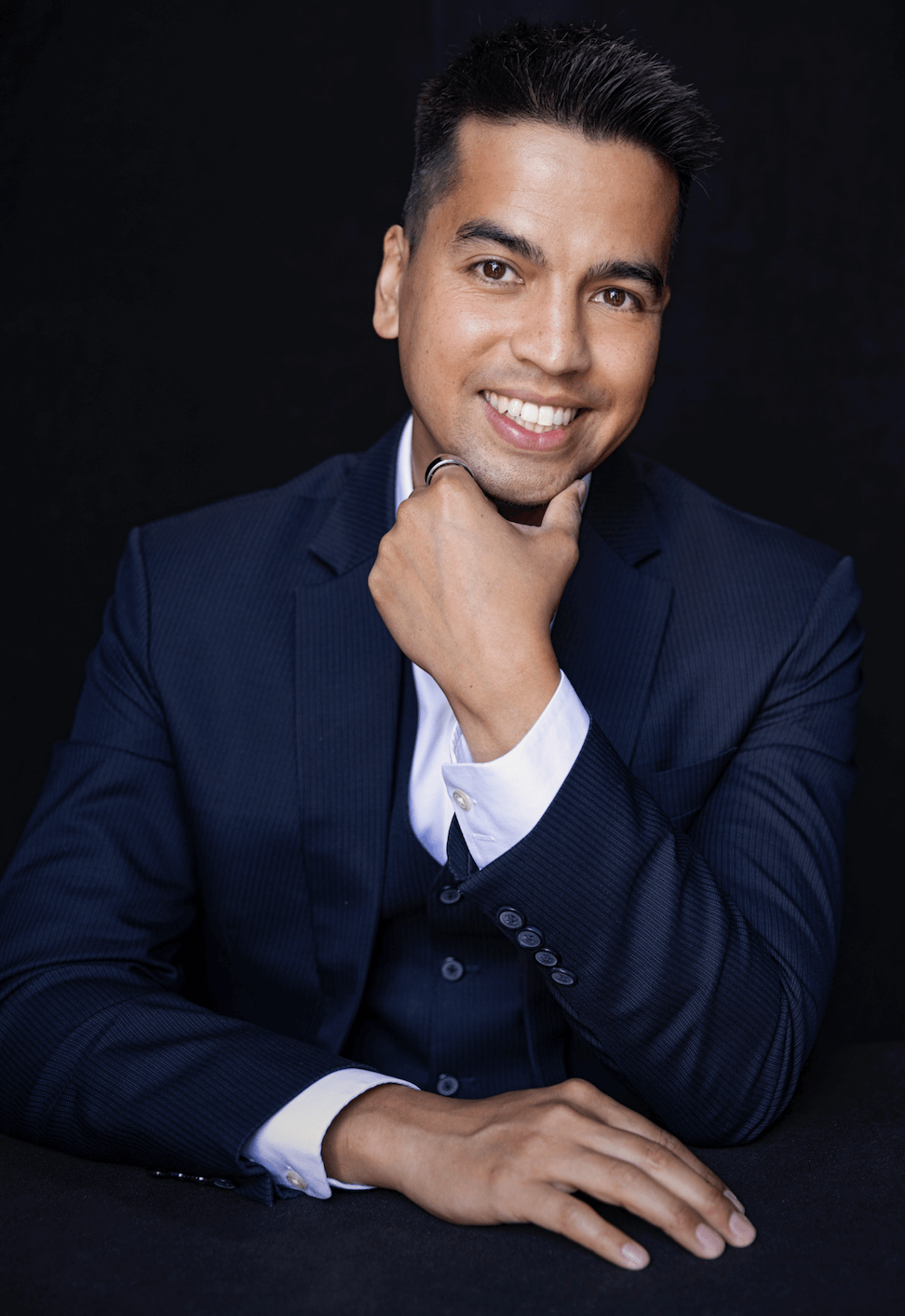 Hery Henry, conference moderator and event host, on stage